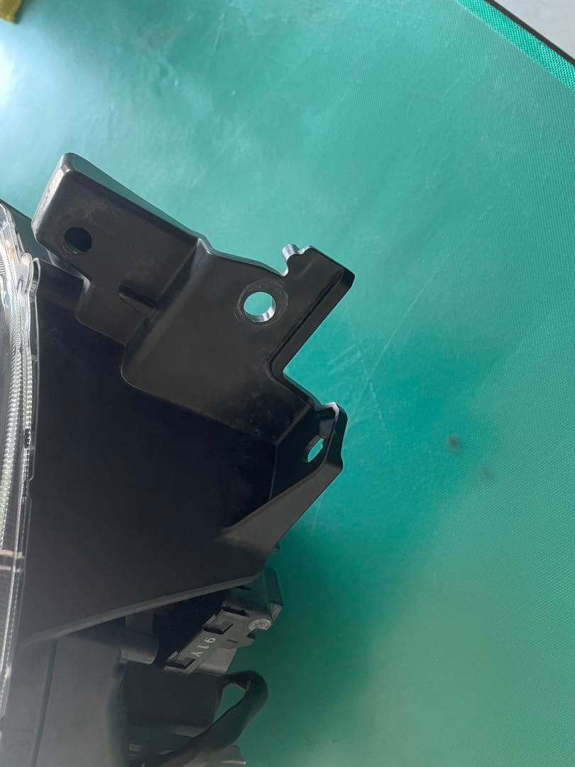 TT　　　ダイハツ　ミラトコット　LA560S 左ヘッドライト