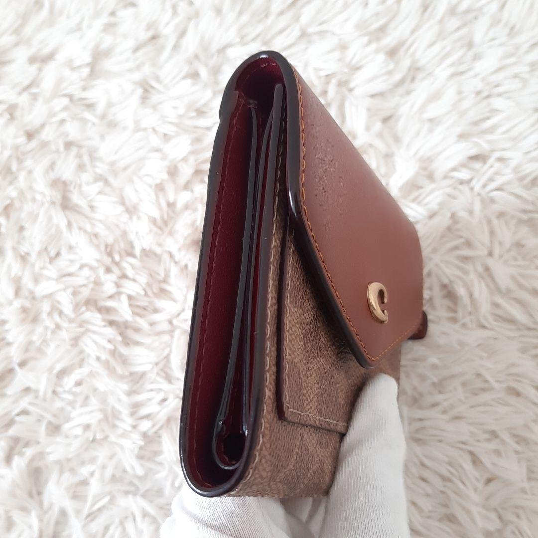 未使用品　COACH　コーチ　三つ折り財布　シグネチャー　ブラウン　C2329