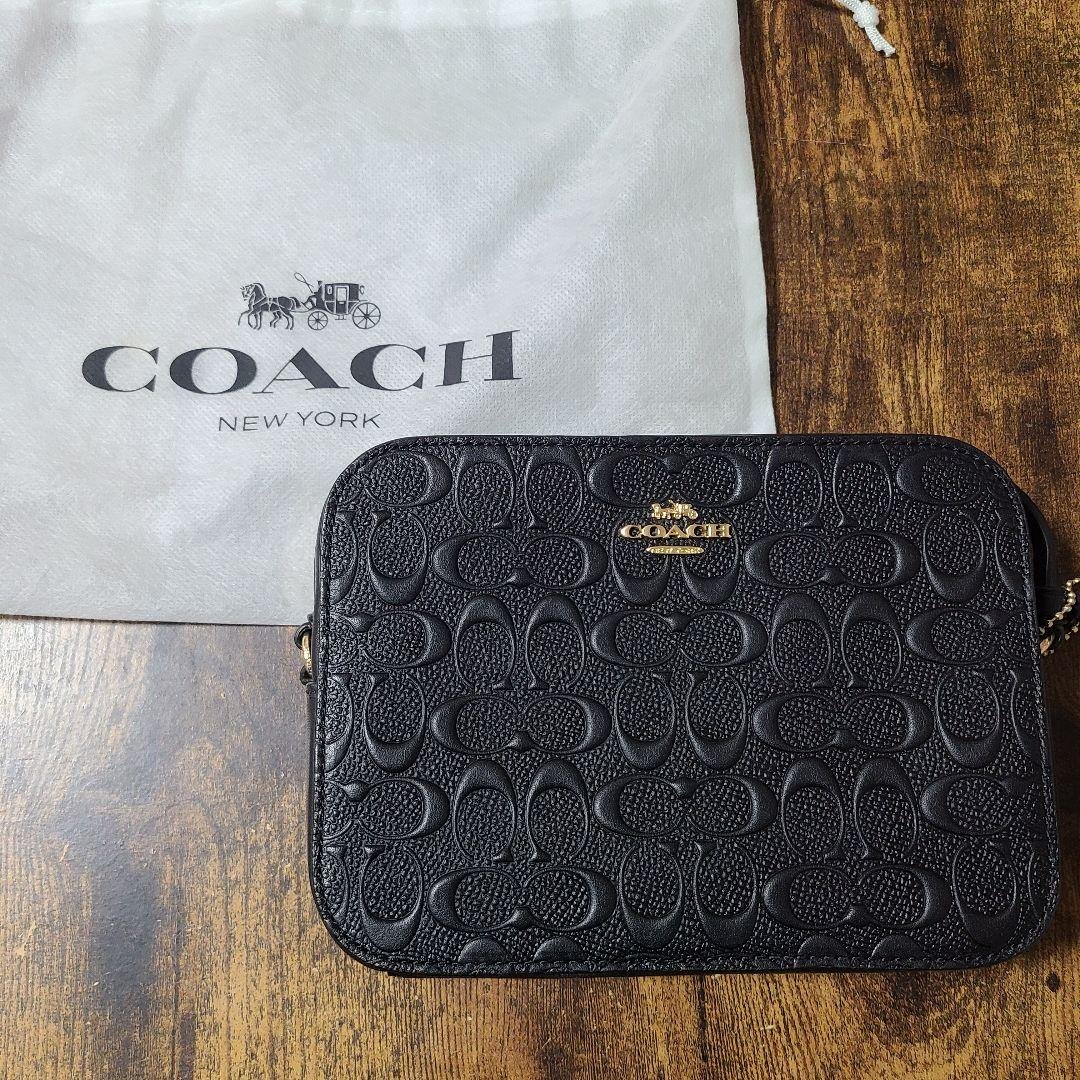 新品未使用 COACH レザー ショルダーバッグ エンボス加工 斜め掛け 黒
