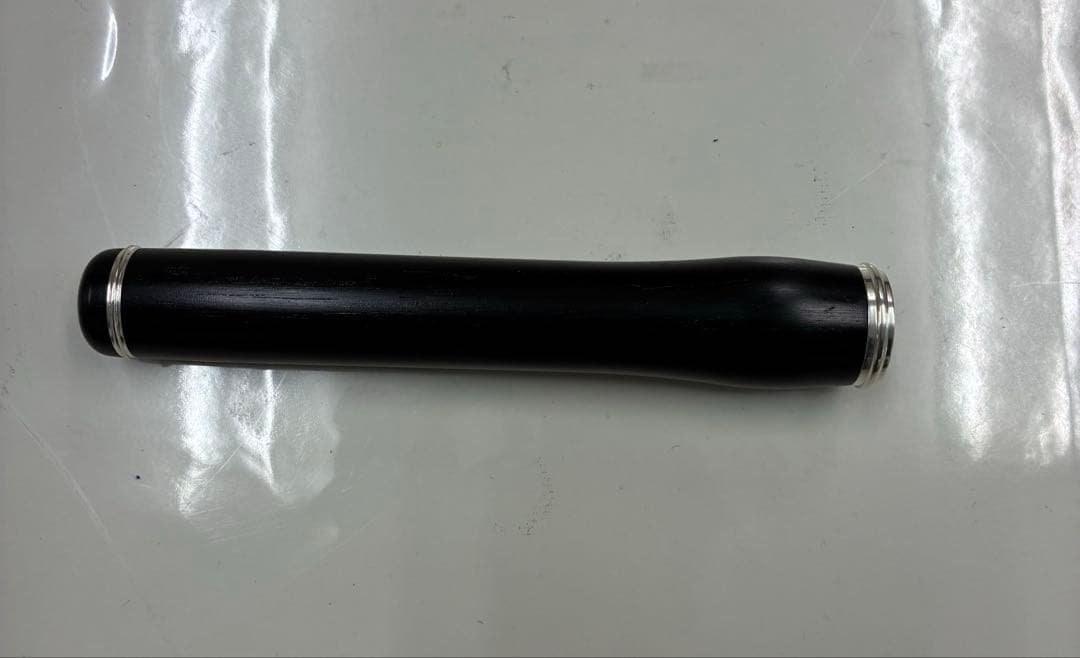 黒い木製ピッコロ用アクセサリー